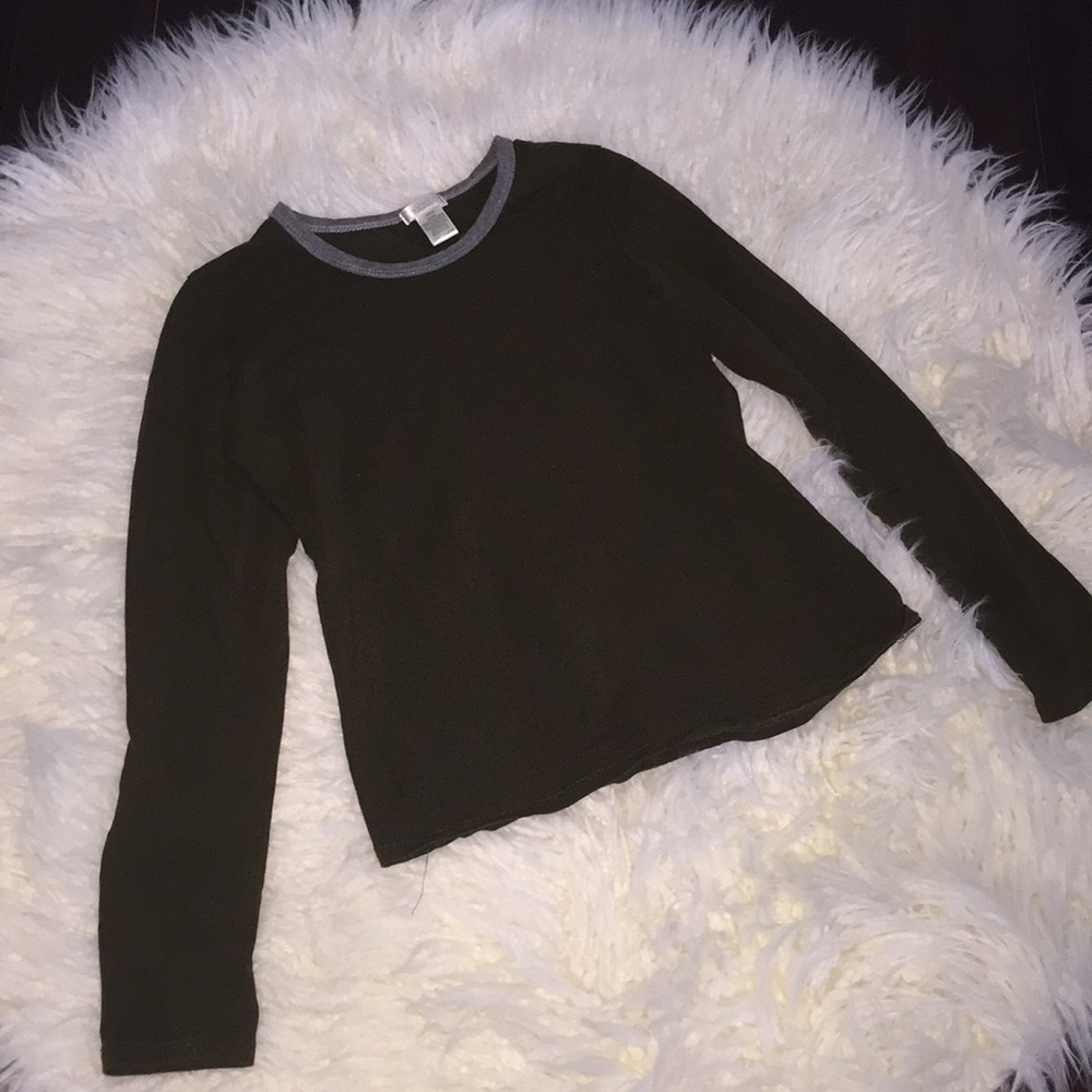 I am selling a beautiful long sleeved green shirt.